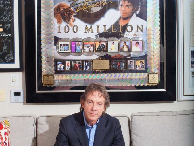 John-with-100-million-Thriller-award-2-683x1024-1